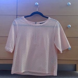 pink shirt with hole design pattern